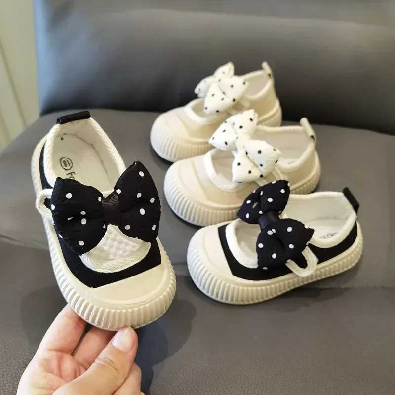 Girls fashion shoes canvas sneakers childrens polka dot bow princess apartment breathable baby shoes student soft soled casual spring shoes W250407