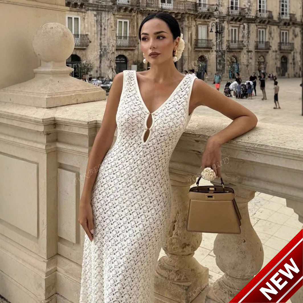 New 2025 model!! Knitted beach dress sexy sleeveless hollow out perspective seaside vacation dress sunscreen suit