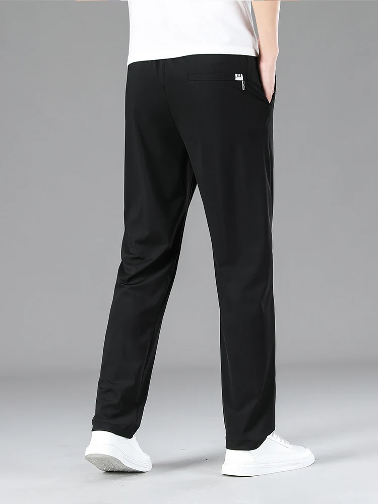 Mens clothing highquality casual pants summer thin ice silk straight stretch waist jogging sports mens Trouser 250403