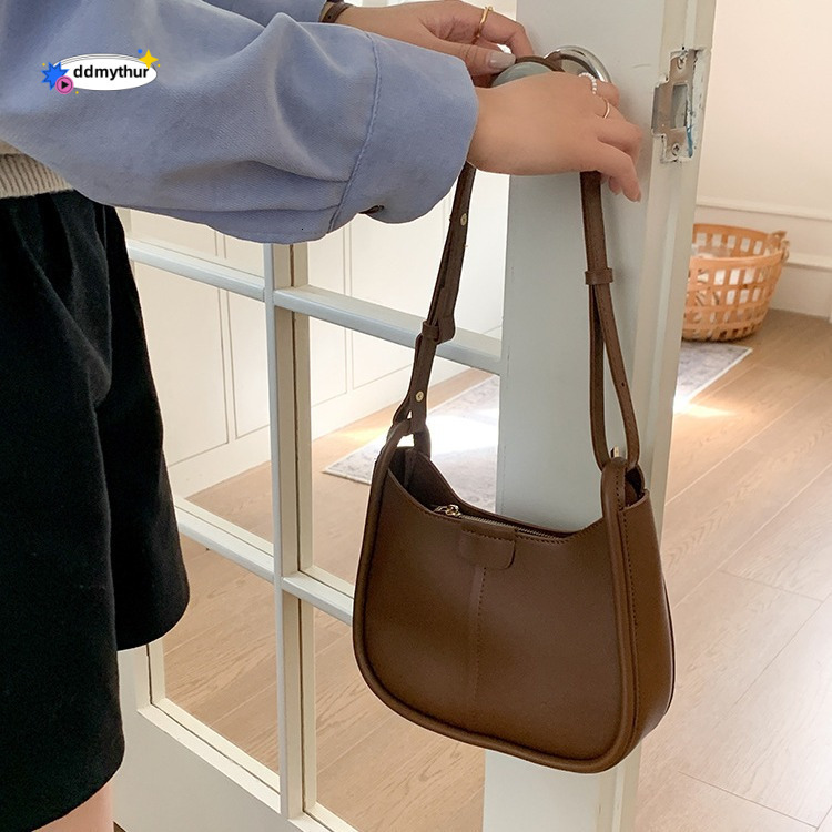 A niche texture underarm for women in winter, a high-end and fashionable new Korean version saddle bag, versatile single shoulder crossbody bag ddmyth