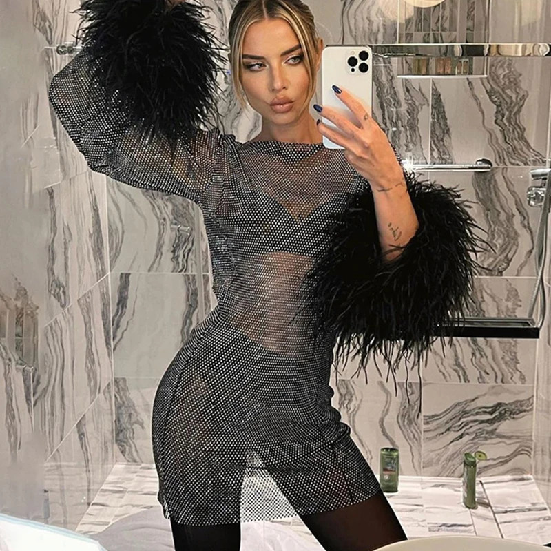 Festive sexy loose transparent rhinestone womens fashion fish net crystal O-neck feather long sleeved mini dress 250402