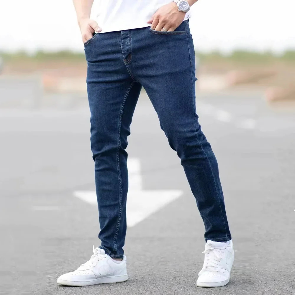 Spring mens black and blue pants solid color elastic jeans street casual slim fit tight 250408