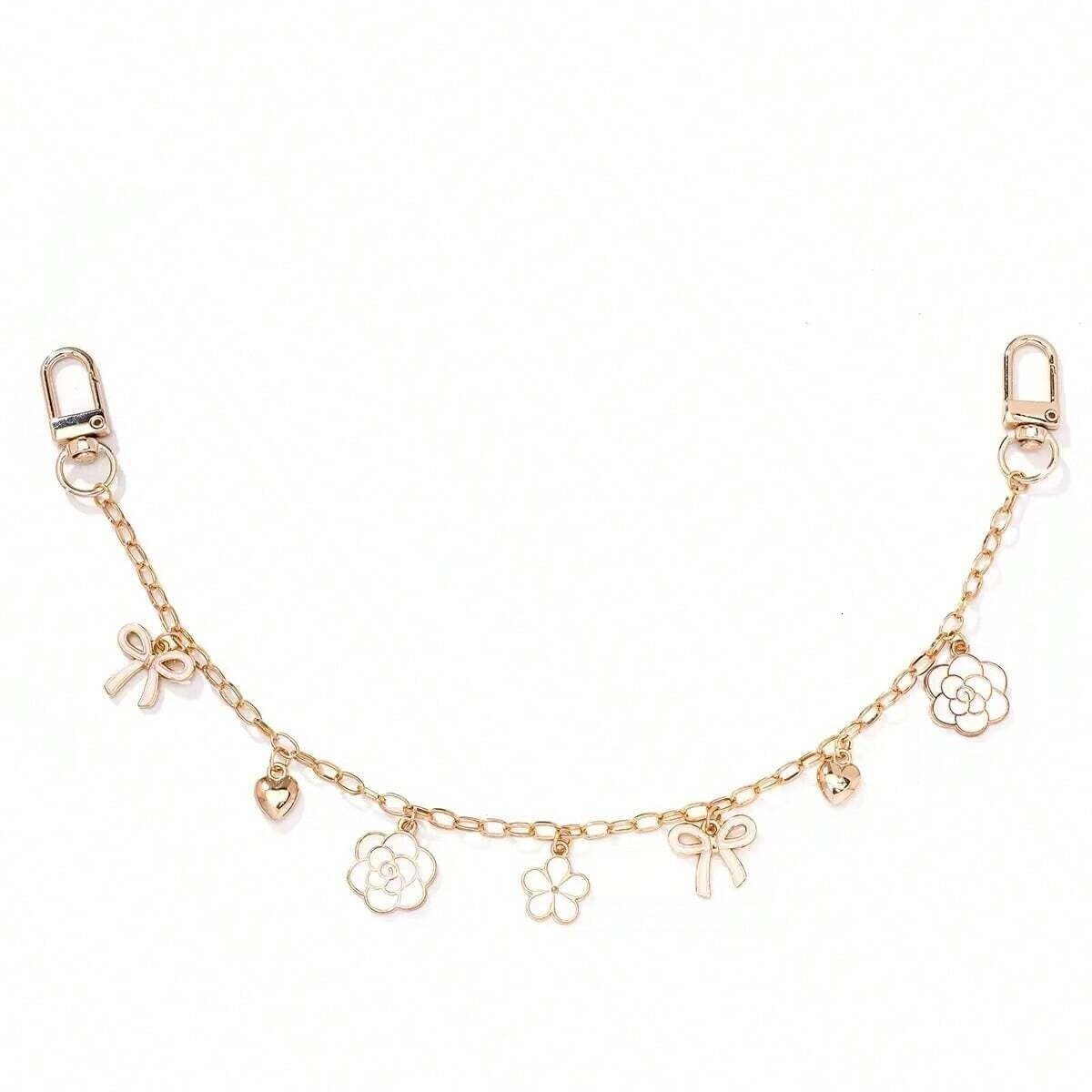 Luxury keychain designer Donkey Brand New Four-Leaf Clover Alloy Light Luxury Keychain Bag Pendant Wholesale Accessories key chain