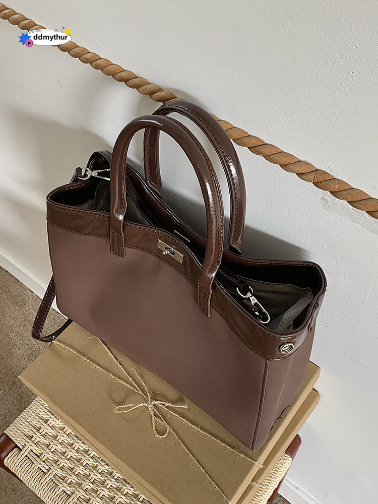 Korean niche hand-held Kelly for women's autumn and winter 2024 new fashionable commuting bag, single shoulder crossbody bag