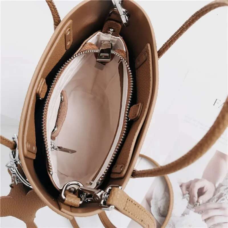 2024 Most Popular T Cowhide Leather Bucket Small Neat All-Match Elegant Women Shoulder Bag With Elephant Ornaments