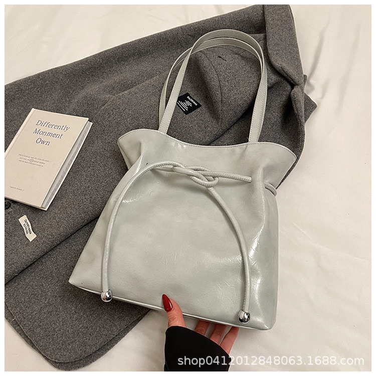 Korean lazy style large capacity tote for women 2025 new strap bow pleated oil wax leather shoulder bag ddmythur