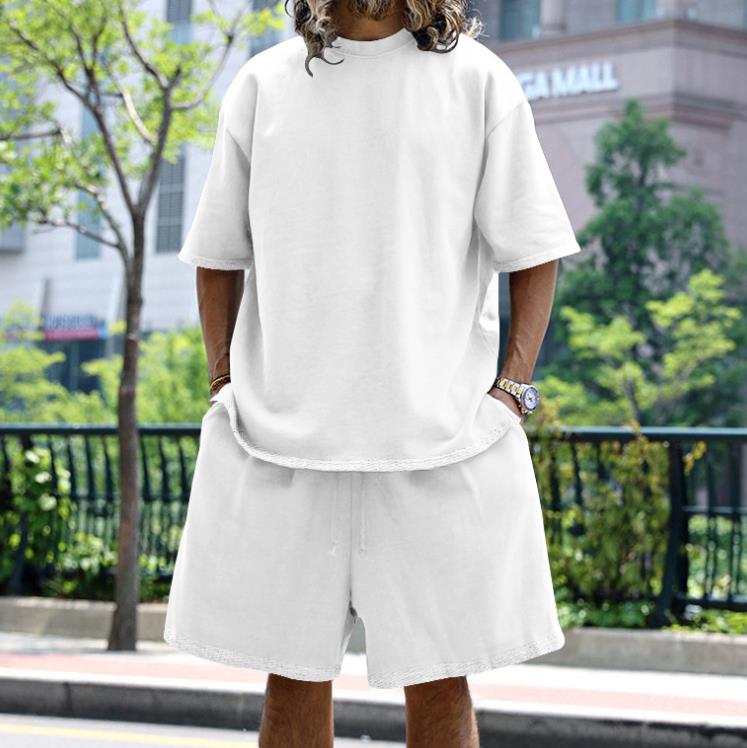 Crossing the border between Europe and United States with casual mens clothing in solid color loose short sleeved simple street trend style set 250326