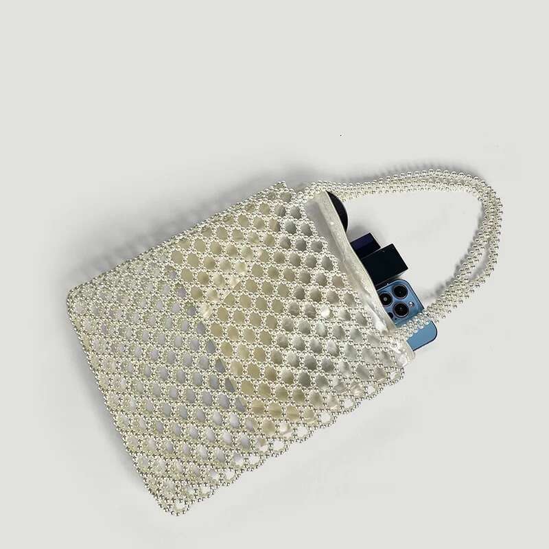 2025 New Summer Vacation Boho Beach Hollow Out Shoulder Bag For Women Handmade Beading Handbag White Metal Top Handle Tote