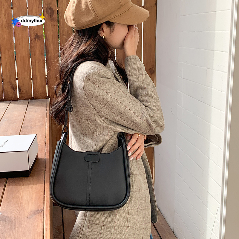 A niche texture underarm for women in winter, a high-end and fashionable new Korean version saddle bag, versatile single shoulder crossbody bag ddmyth