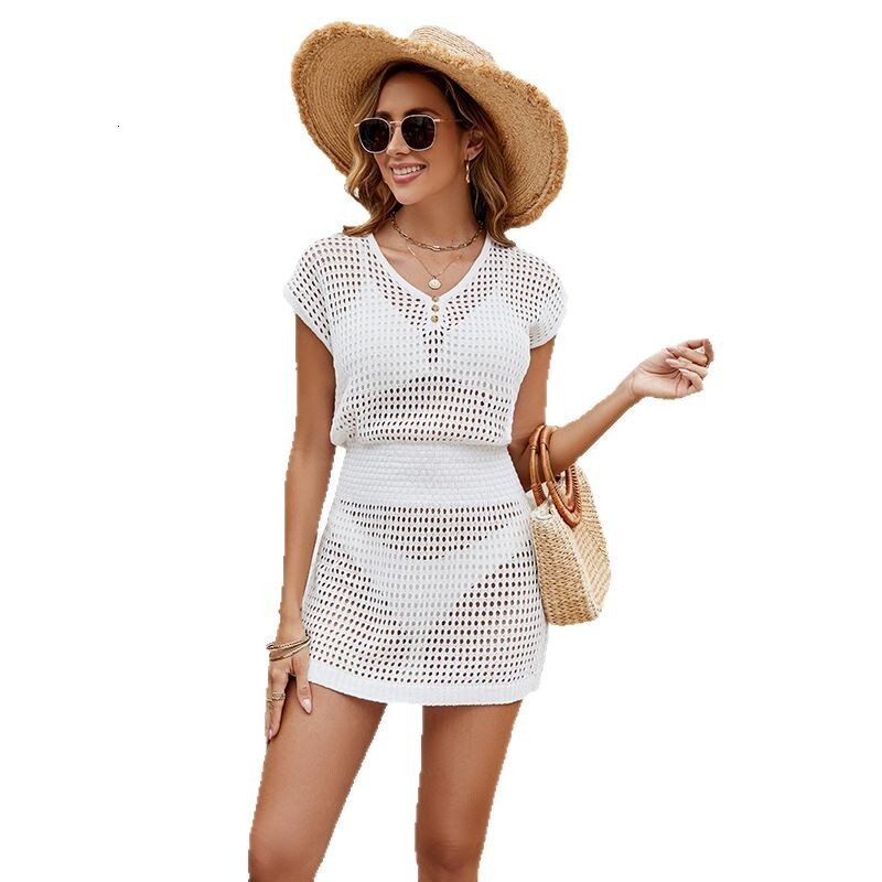 2025 Summer New Beach Skirt Womens Solid Color Knitted Hollow Beach Bikini Swimsuit Womens Dress