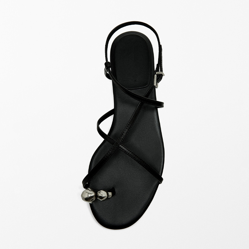 hot 2025 Women's genuine leather metal toe-ring Roman summer style open-toe flat sole one-word cross strap sandals new design