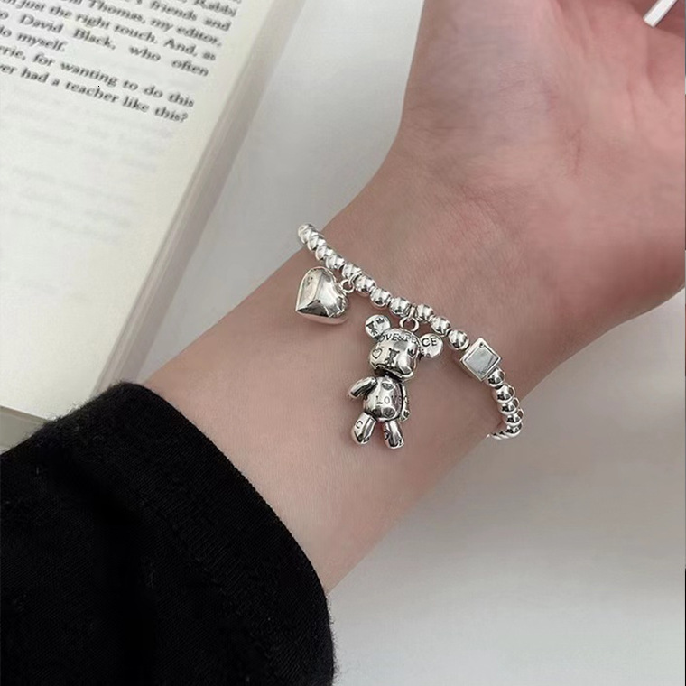Love nical teddy bear stainless steel couple bracelet, niche high-end elastic rope bracelet