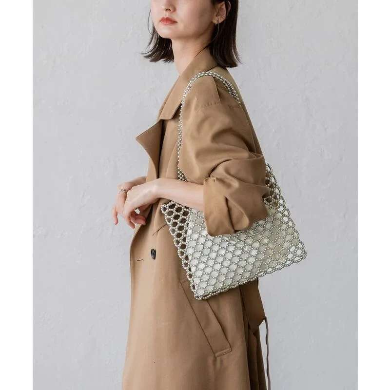 2025 New Summer Vacation Boho Beach Hollow Out Shoulder Bag For Women Handmade Beading Handbag White Metal Top Handle Tote