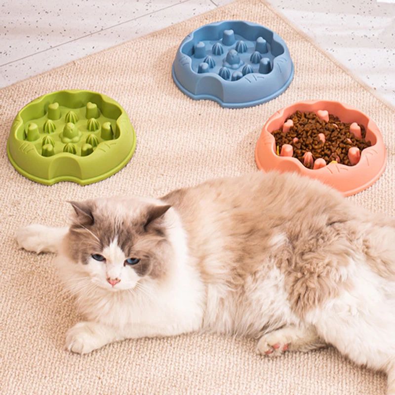175283 The outer side of the bowl is wrapped in soft plush material, providing warmth in winter and keeping cats' paws warm during meals.