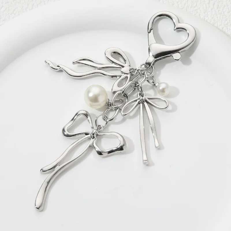 Y2K beautiful bow pearl enamel keychain flying insect keyring womens handmade jewelry great giftXJ250409