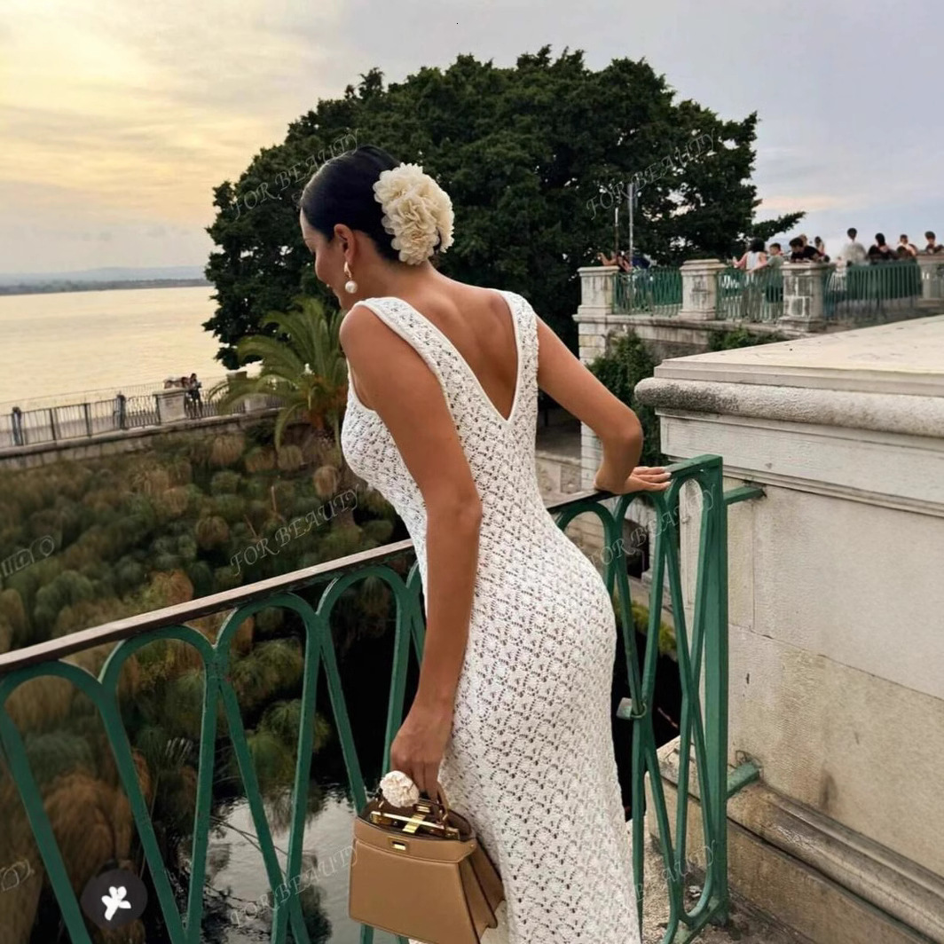 New 2025 model!! Knitted beach dress sexy sleeveless hollow out perspective seaside vacation dress sunscreen suit