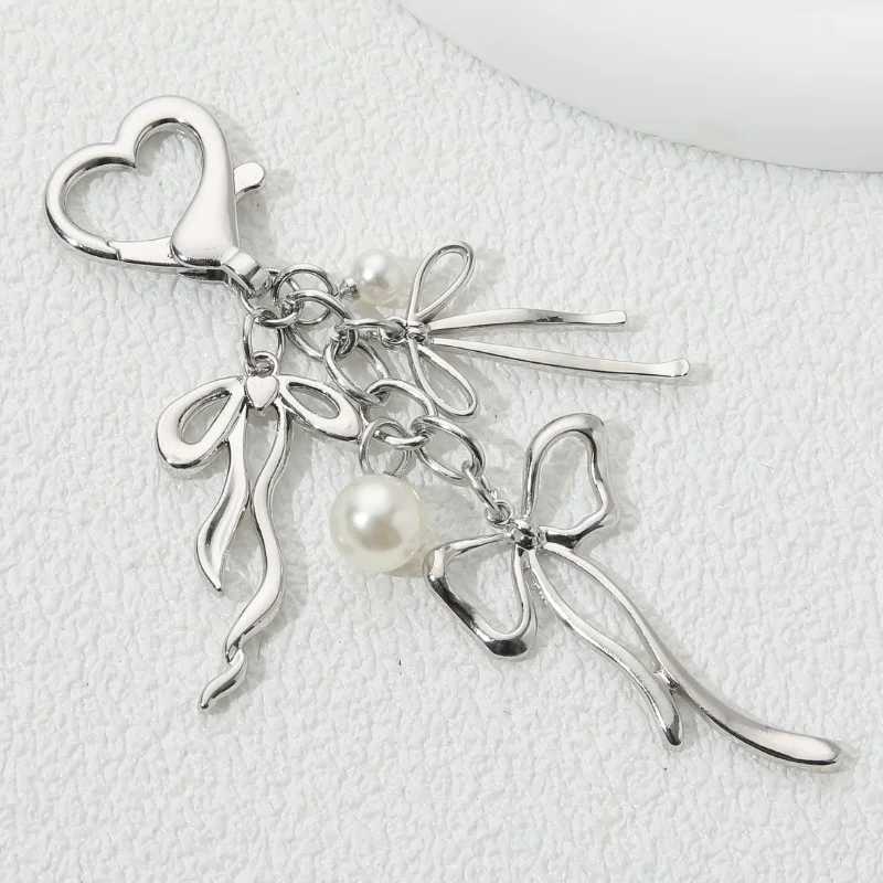 Y2K beautiful bow pearl enamel keychain flying insect keyring womens handmade jewelry great giftXJ250409