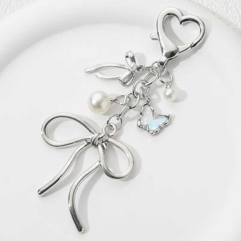 Y2K beautiful bow pearl enamel keychain flying insect keyring womens handmade jewelry great giftXJ250409