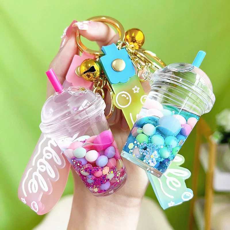 Luminous Camellia Cup Keychain Car Suspension Decoration Floating Quicksand Couple Bag KeychainXJ250409