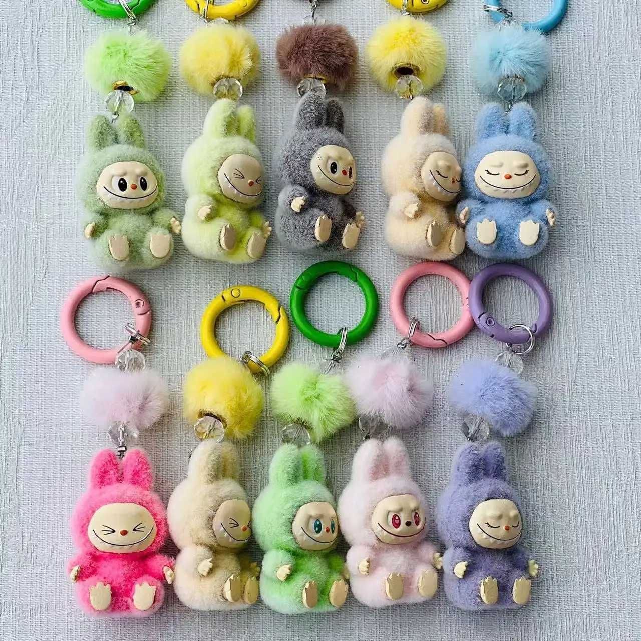 New Labubu Plush keychain cartoon creative 3D doll backpack pendant car keychain mens and womens giftsXJ250409