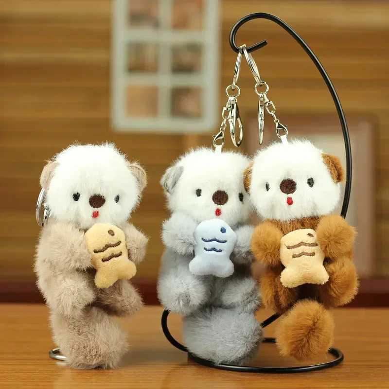 Cute plush otter holding fish keychain fashionable backpack keychain animal school bag key wallet pendant toy student giftXJ250409