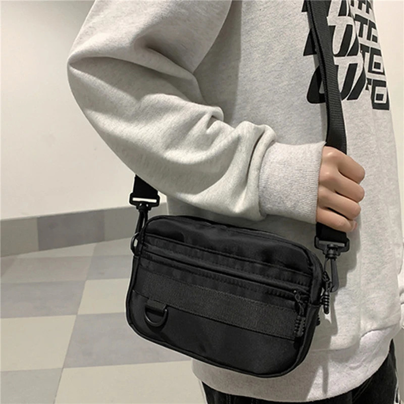 Casual mens unisex cross body bag fashionable solid color couple shoulder highquality nylon messenger handbag 250408