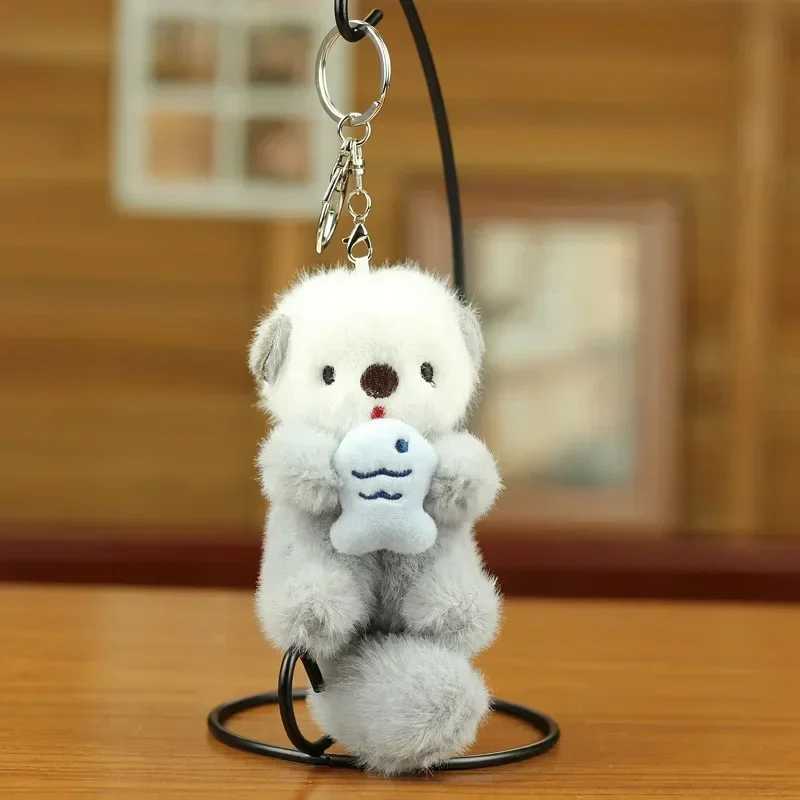 Cute plush otter holding fish keychain fashionable backpack keychain animal school bag key wallet pendant toy student giftXJ250409