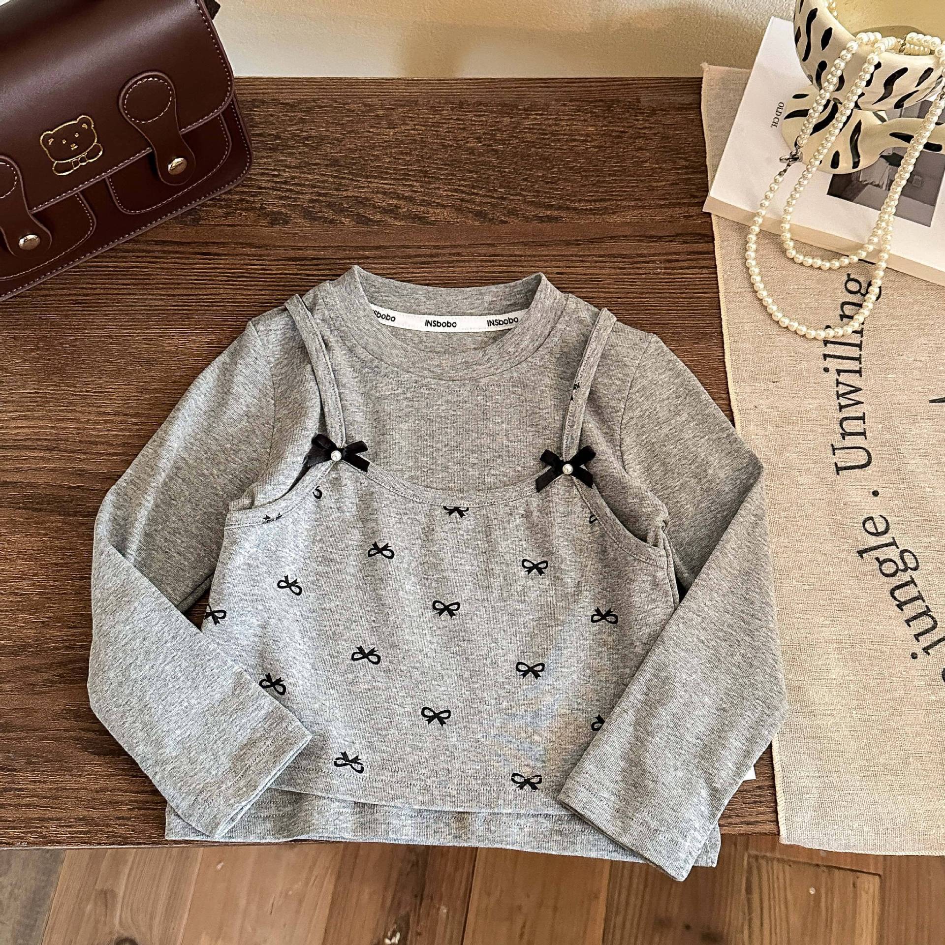 Ddmyshoesvip Girls Autumn New Item Fake Two Piece Solid Color Versatile Butterfly Knot Splicing Base Shirt Long Sleeved T Shirt
