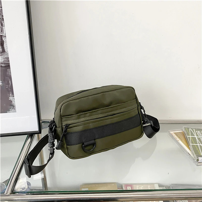 Casual mens unisex cross body bag fashionable solid color couple shoulder highquality nylon messenger handbag 250408
