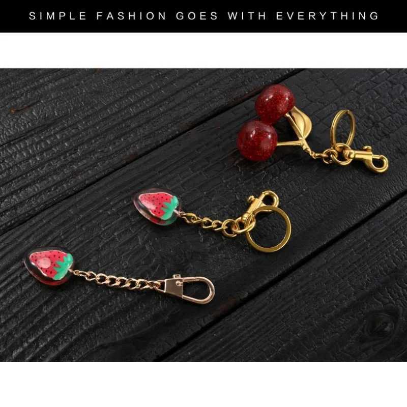 Red cherry pendant keychain womens cute packaging decoration multifunctional jewelry car key Accor Tren charm keychainXJ250409