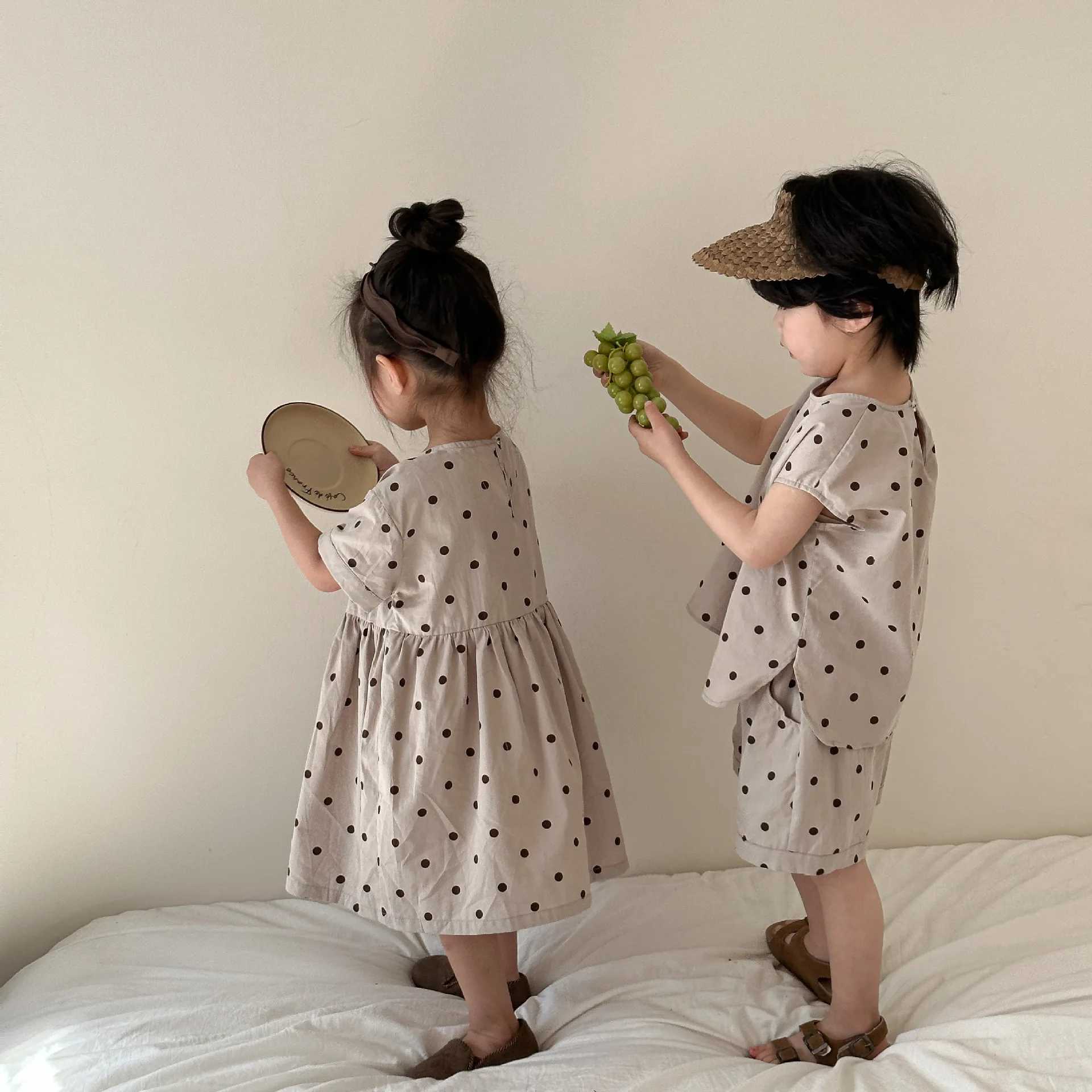 Summer 2024 New Childrens Short Sleeve Set Toddler Boys Top Shorts Loose Childrens Girls Pocket Monster Point Dress Brother sisters Set S2548
