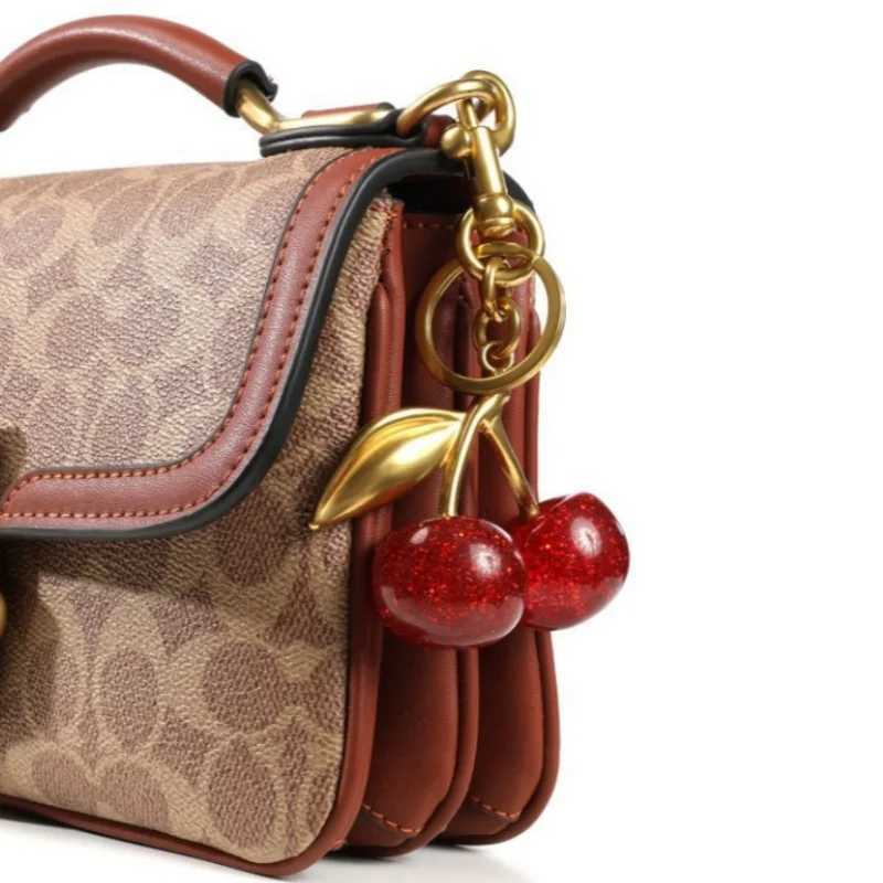 Fashionable and Delicious Red Cherry Keychain Summer Fruit Cherry Pendant Keychain Womens Jewelry Bag Decorative Gift 2024XJ250409
