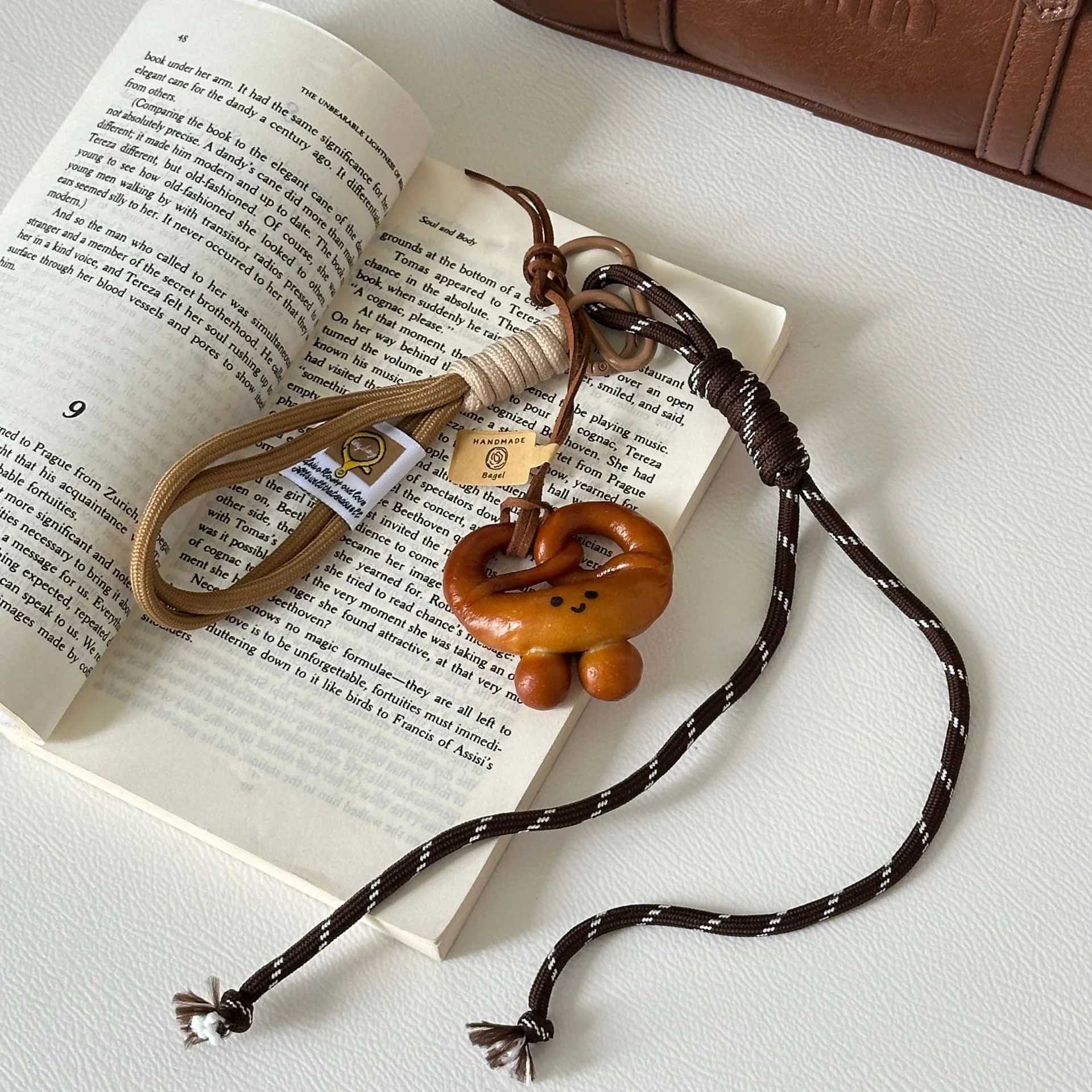 Cute face bread keychain alkaline water surface bag keychain woven rope pendant bag keychain handmade Tren giftXJ250409