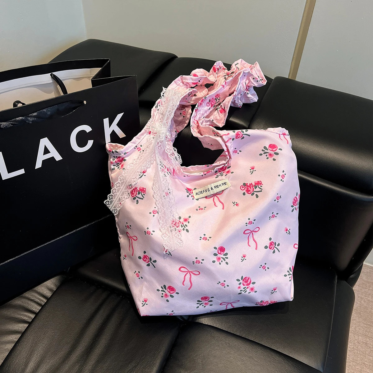 Cute floral and butterfly handbag suitable for women lightweight nylon large capacity magnetic closure daily use travel shopping shoulder bag 250408