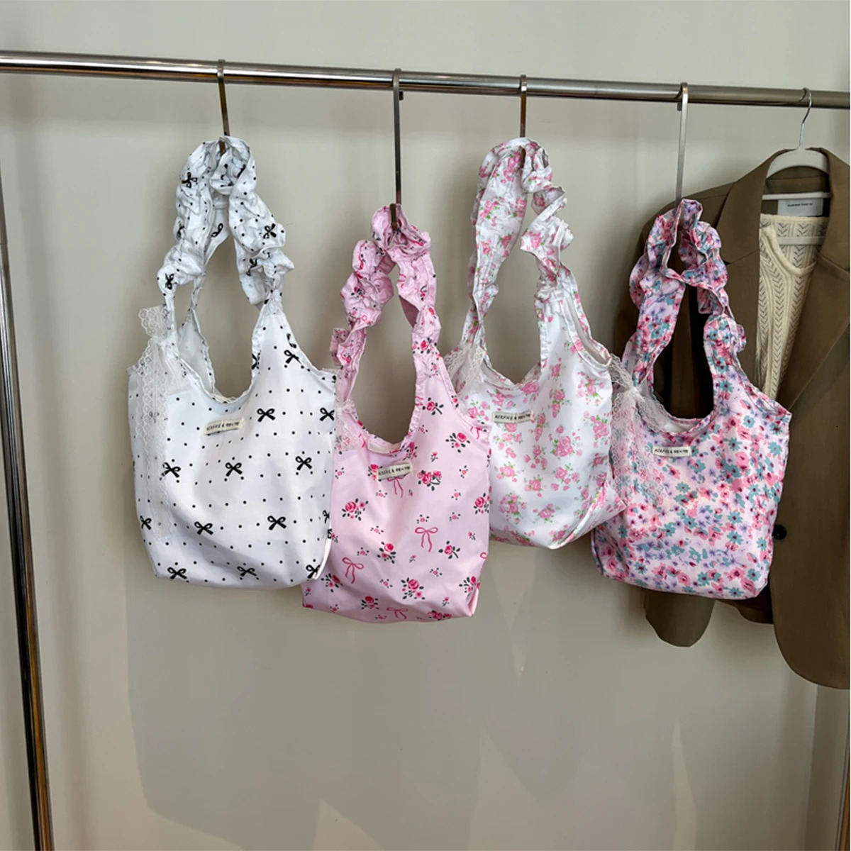 Cute floral and butterfly handbag suitable for women lightweight nylon large capacity magnetic closure daily use travel shopping shoulder bag 250408