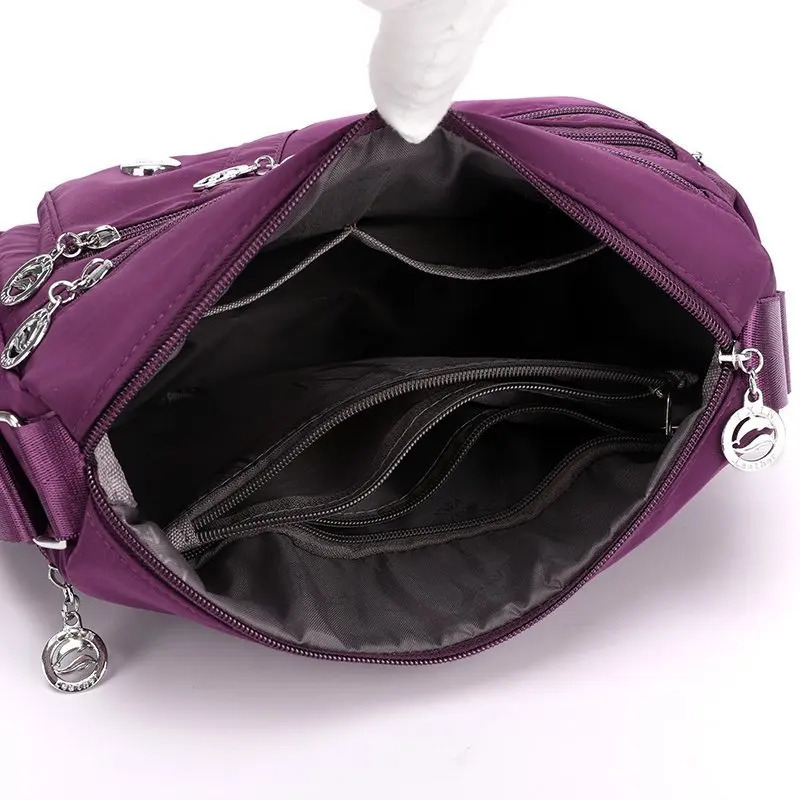 Womens large capacity shoulder bag waterproof and wearresistant multi pocket commuting leisure outdoor cross body 250408
