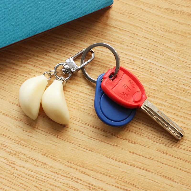 Original and unique garlic pendant keychain student couple personalized bag pendant car keychain jewelryXJ250409