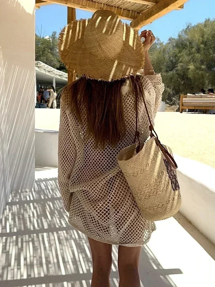 Solid color beach knitted mini dress summer sexy hollow long sleeved swimsuit cover Bohemian holiday loose beachwear K17 250327