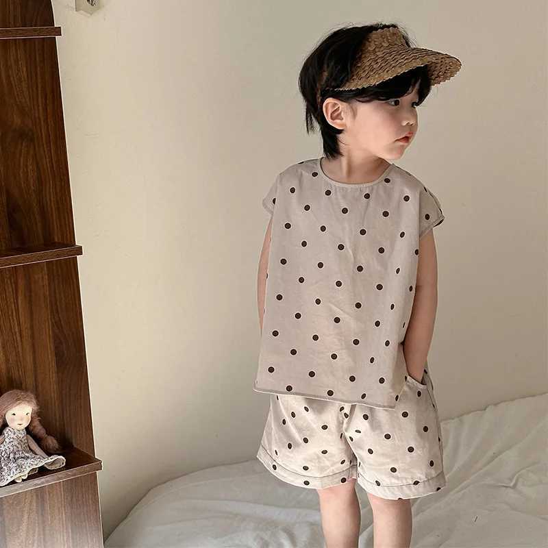 Summer 2024 New Childrens Short Sleeve Set Toddler Boys Top Shorts Loose Childrens Girls Pocket Monster Point Dress Brother sisters Set S2548