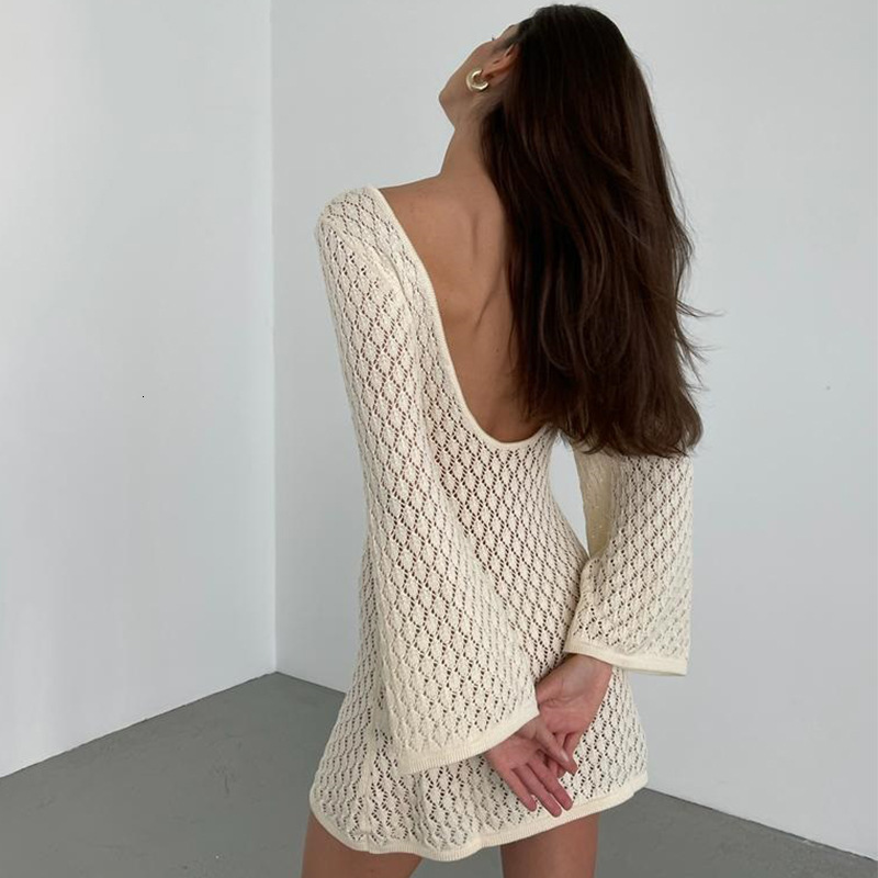 2025 Spring/Summer New Beach Skirt Womens Solid Color Sexy Knitted Hollow Hoodie Dress