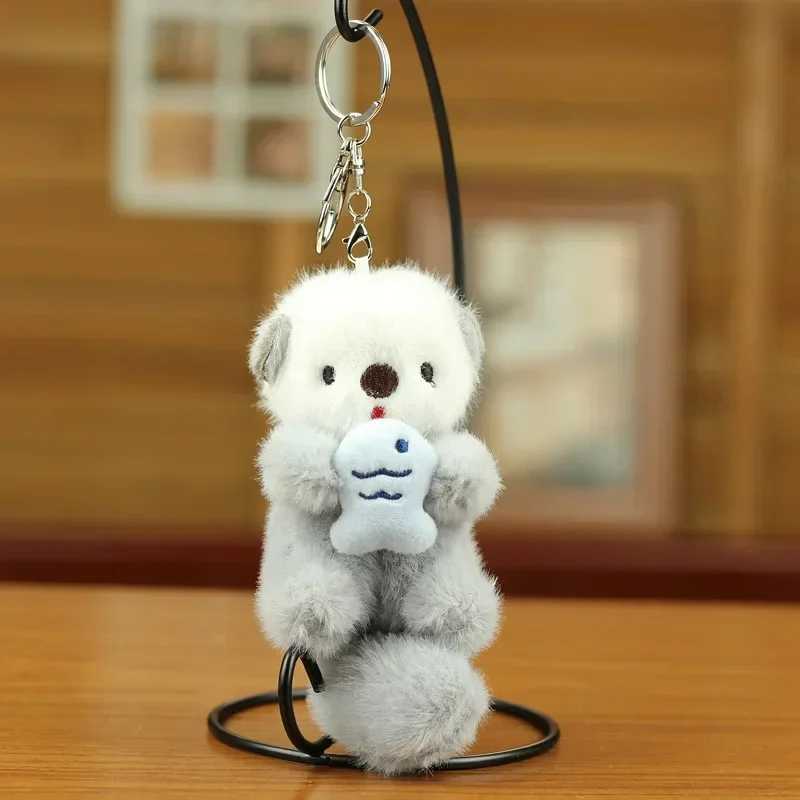 Cute otter holding fish plush pendant keychain fashion backpack keyring pendant school bag keywallet pendant wholesaleXJ250409