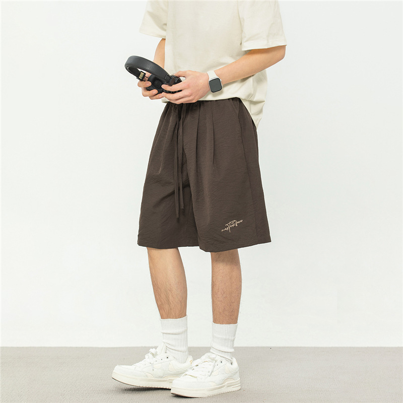 2025 New Designer Men Shorts Texture Micro Wrinkled And Pleated Casual Shorts For Men In Summer New American Letter Embroidered Sports Five Quarter Pa