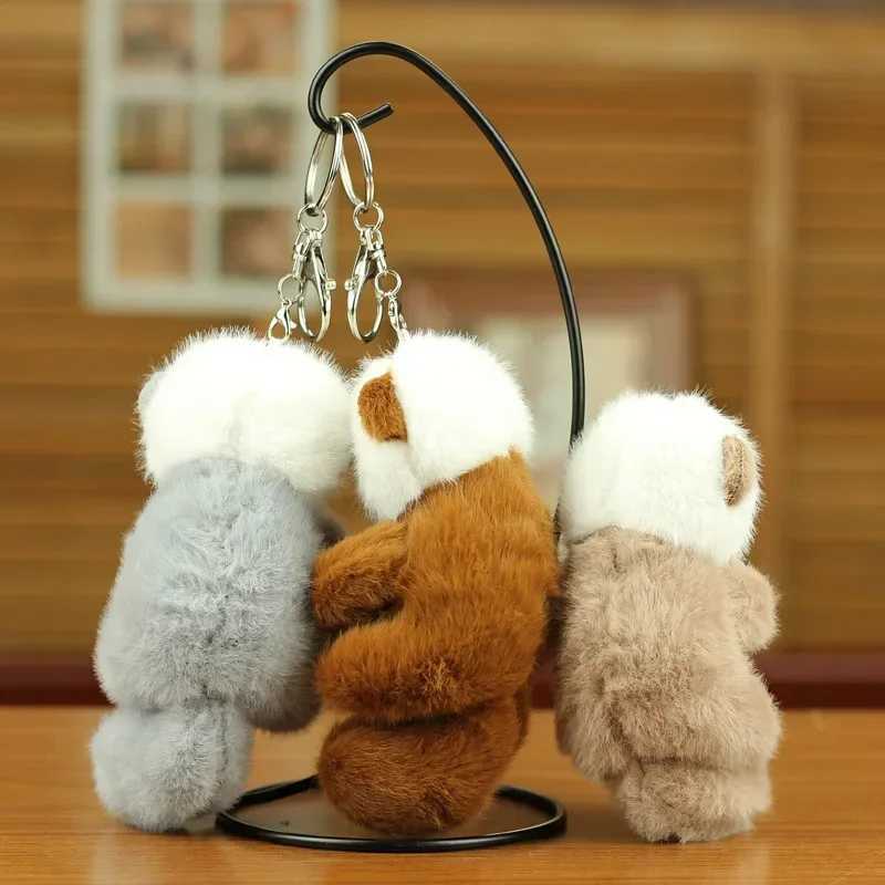 Cute otter holding fish plush pendant keychain fashion backpack keyring pendant school bag keywallet pendant wholesaleXJ250409