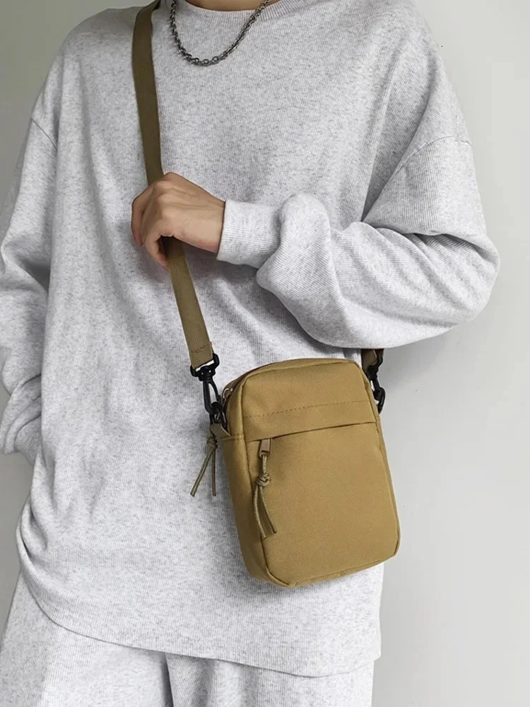 Mens forest style small shoulder bag Ins trend single mens sports and leisure backpack womens simple 250408