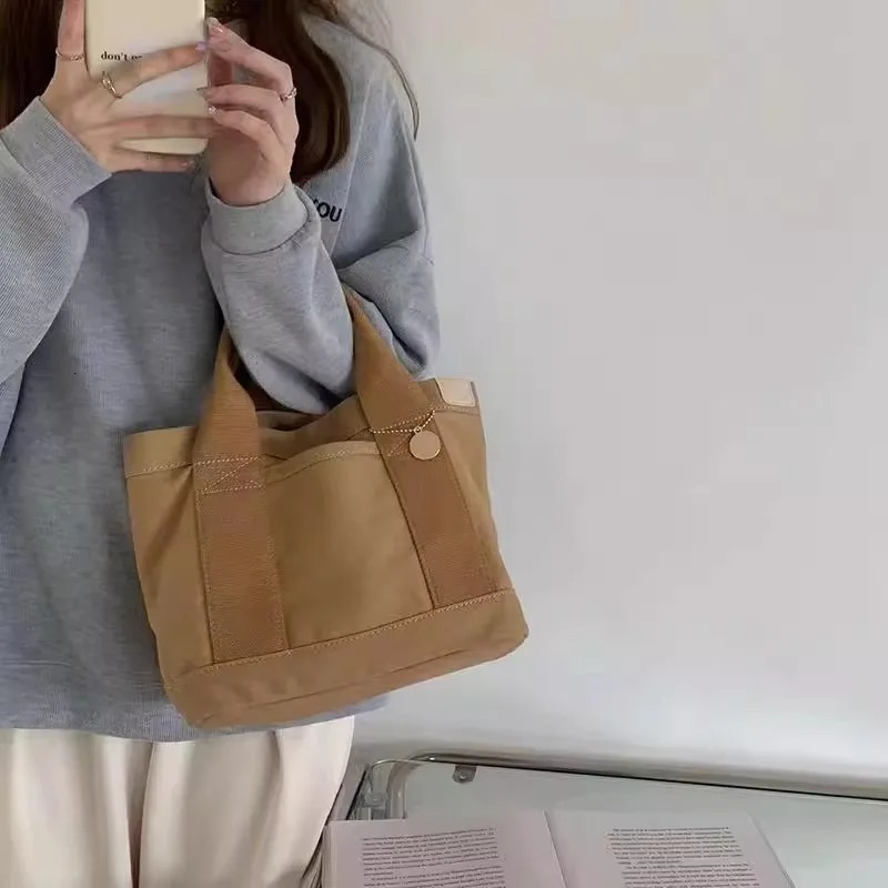 Trendy Japanese canvas top handbag with multilayer n convenient for leisure activities INS style lunch box 250408
