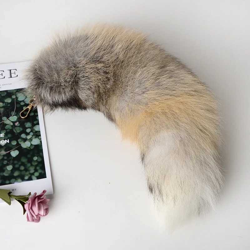 2024 New Tail Keychain Wolf Tail Fur Leather Tassel Bag Label Black and Brown Pom Charm Keychain Bracket Str Chain GiftXJ250409