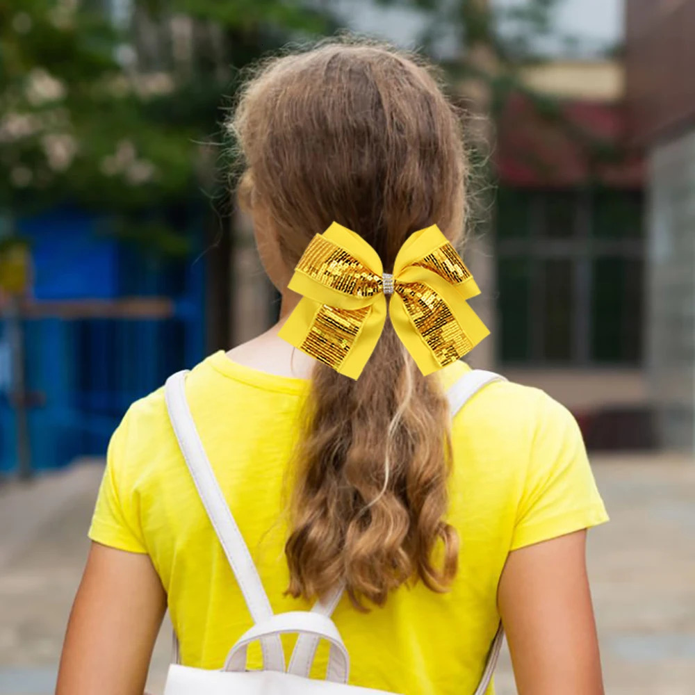 Free delivery of 12 sequined cheerleading bow shaped solid color swan tail hair clips sparkling girl hair bow accessories 250409