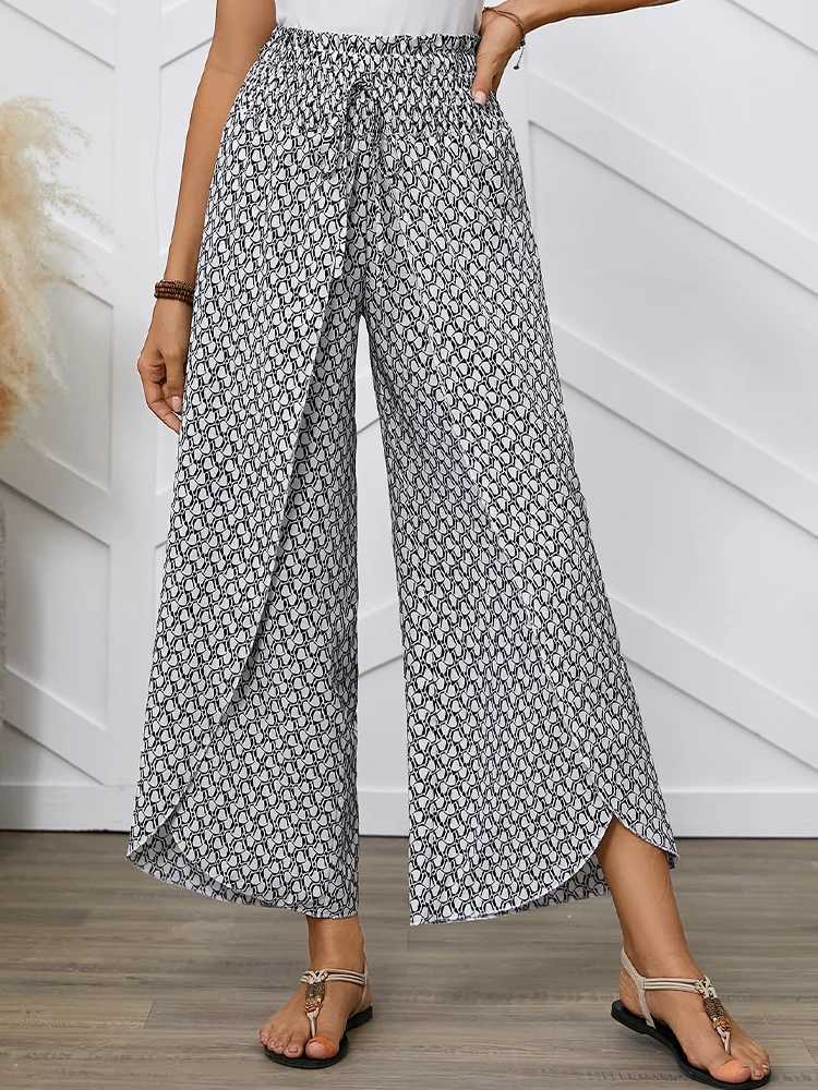 Spring and summer womens French full print waist tulip hem loose cross pantsXJ250403