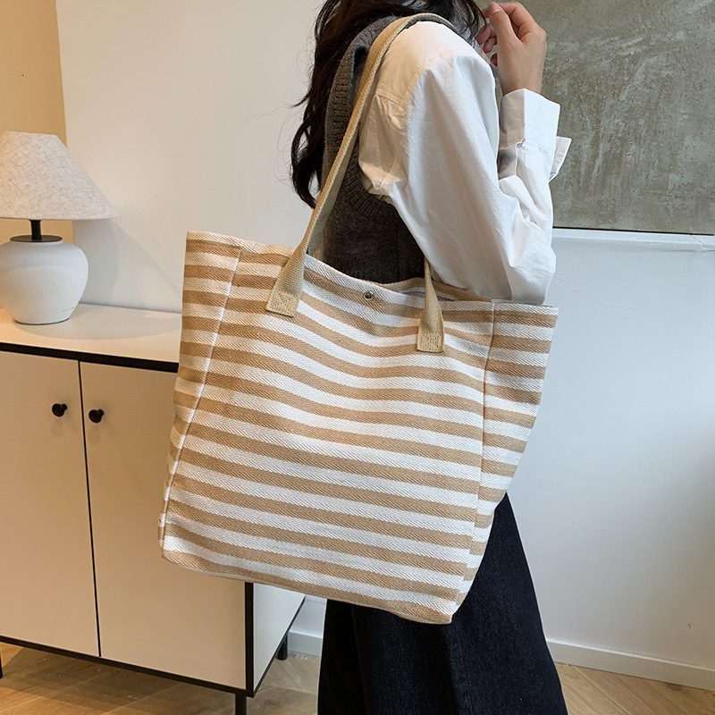Women's Large Capacity Single Shoulder 2025 New Women's Designer Bag Niche Zebra Print Canvas Handheld Mother Handbag Outdoor Leisure Multif