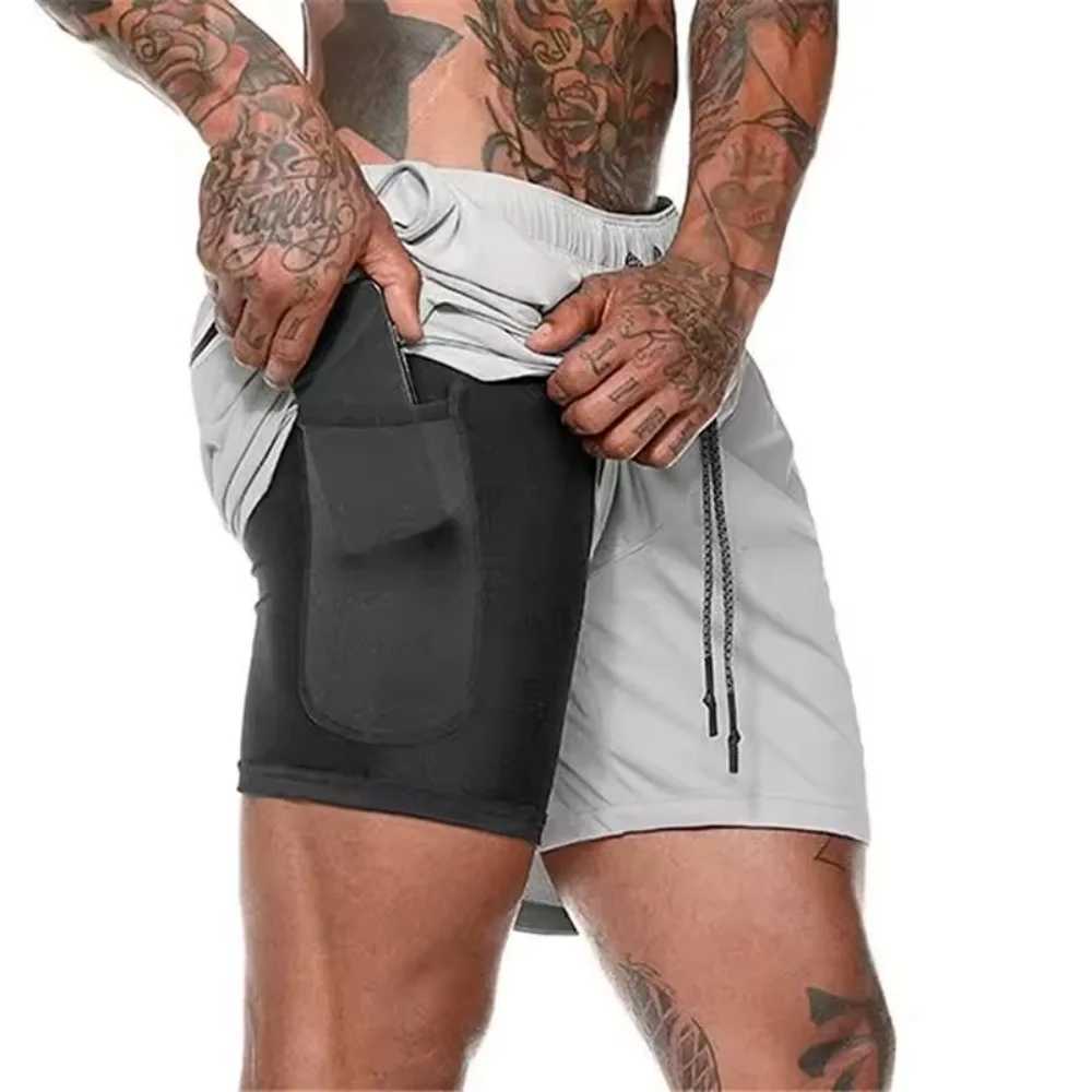Mens fitness built-in pocket sports shorts summer 2-in-1 quick drying gym beach shorts running double-layer mesh shorts X250410
